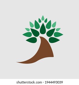 Tree logo with green leaves