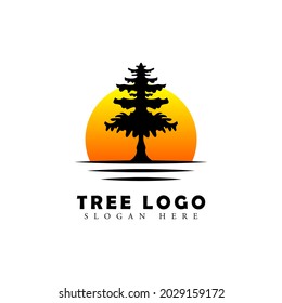 tree logo in vintage style. tree and sunrise concept logo