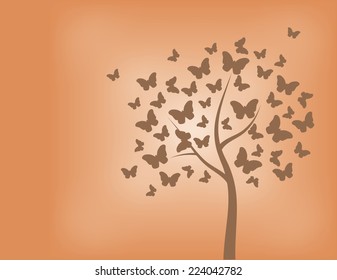 Tree made of butterflies in shades of orange
