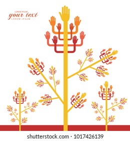 The tree made of multicolored hands