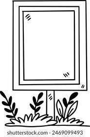 A tree is next to a sign that is blank. The sign is white and has a black border. The tree is tall and has green leaves