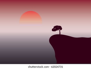 a tree on a brink of a precipice