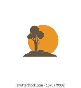 Tree on an island with a sun goes down