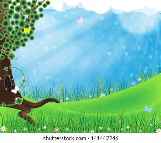 Tree on meadow with grass, blue sky with clouds and butterflies