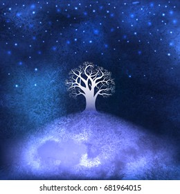 Tree on the slope against the background of the starry sky.