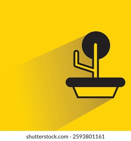 tree in plant pot icon with drop shadow on yellow background