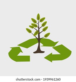 Un árbol con flechas de reciclaje a su alrededor. para la conservación del planeta.