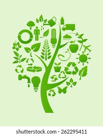 Árbol con símbolos de reciclaje