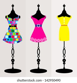 Tree retro dresses on body forms / fashion mannequin 