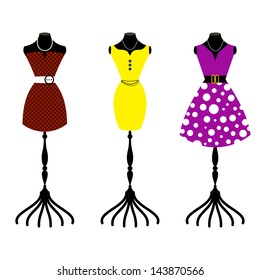 Tree retro dresses on body forms / fashion mannequin 