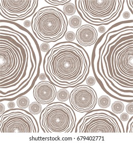 Tree rings seamless brown and white vector pattern background illustration.