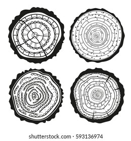Tree rings. Set of cross section of the tree with abstract patterns on isolation background. Conceptual graphics. Black and white illustration for coloring. Zentangle. Zen art