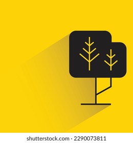 tree with shadow on yellow background