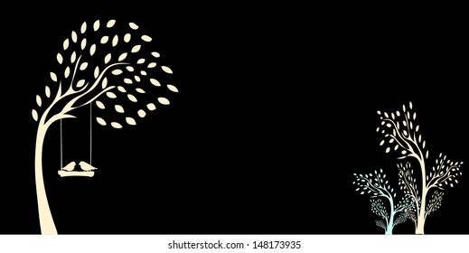 Tree silhouette with birds in love on a swing