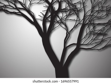 A tree without leaves. Silhouette isolated black on a gray background. Vector illustration for your design.