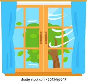 Trees blown by strong winds seen from the window