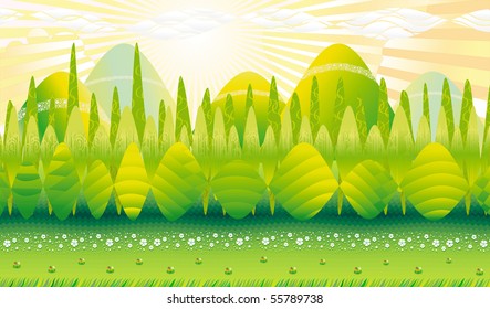 Trees, hills and fields in the sun in summer.