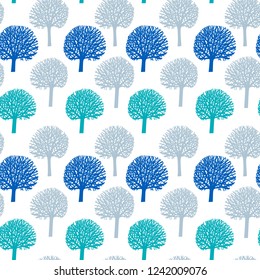 Trees silhouettes of three colors repeating in seamless pattern. Design for backgrounds, textile, wallpapers, covers and packaging