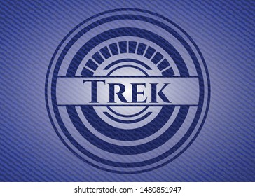 Trek emblem with jean texture. Vector Illustration. Detailed.