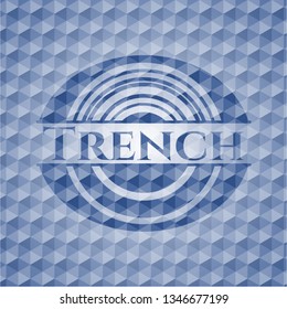 Trench blue badge with geometric pattern.