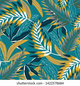 Trend seamless pattern with bright tropical leaves and plants on a green background. Vector design. Jung print. Floral background. Printing and textiles.