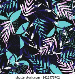 Trend seamless pattern with bright tropical leaves and plants on a black background. Vector design. Jung print. Floral background. Printing and textiles.