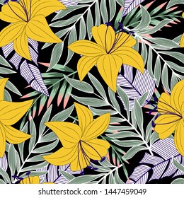 Trend seamless pattern with colorful tropical leaves and flowers on black background. Vector design. Jungle print. Floral background. Printing and textiles. Exotic tropics. Fresh design.