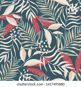 Trend seamless pattern with tropical leaves and plants on green background. Vector design. Jungle print. Textiles and printing. Floral background.