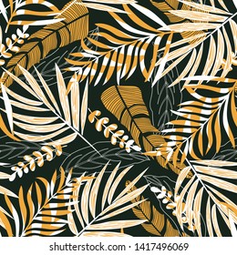 Trend seamless pattern with tropical leaves and plants on a delicate gray background. Vector design. Jungle print. Textiles and printing. Floral background.