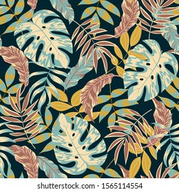 Trend seamless pattern with tropical leaves on dark background. Floral tropical pattern background with leaves, jungle leaf. Vector background for various surface. Exotic wallpaper, Hawaiian style.