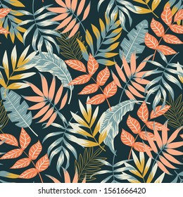 Trend seamless pattern. Tropical plants and leaves on a dark background. Illustration in Hawaiian style. Jungle leaves. Botanical pattern. Vector background for various surface. 