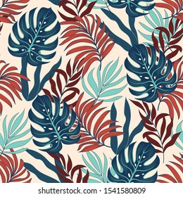 Trend seamless tropical pattern with bright blue and red plants and leaves on white background. Summer colorful hawaiian seamless pattern with tropical plants. Exotic wallpaper.