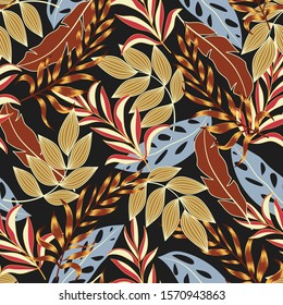 Trend seamless tropical pattern with bright blue and red plants and leaves on a dark background. Seamless exotic pattern with tropical plants. Tropical botanical.