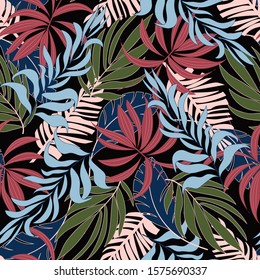 Trend seamless tropical pattern with bright pink and green plants and leaves on black background. 
Seamless exotic pattern with tropical plants. Tropic leaves in bright colors.