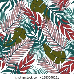 Trend seamless tropical pattern with bright blue and red plants and leaves on delicate background. Seamless exotic pattern with tropical plants. Exotic jungle wallpaper.