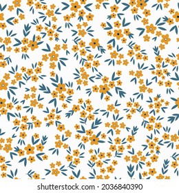 La tendencia es un patrón de cosecha sin fisuras. Flores naranjas pequeñas, hojas verdes sobre un fondo blanco. Textura vectorial. impresión para textiles y papel pintado.
