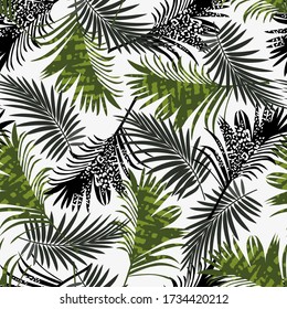 Trend summer seamless pattern with tropical green black plants on a white background. Floral pattern.Trendy summer Hawaii print.  Creative abstract background. Jungle leaves. Exotic wallpaper.