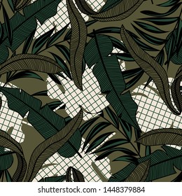 Trending abstract seamless pattern with colorful tropical leaves and plants on green background. Vector design. Jungle print. Floral background. Printing and textiles. Exotic tropics. Fresh design.