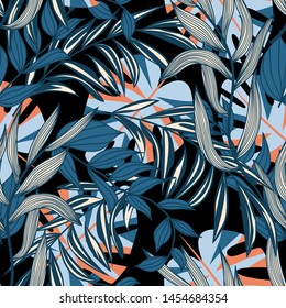 Trending abstract seamless pattern with colorful tropical leaves and plants on black background. Vector design. Jungle print. Flowers background. Printing and textiles. Exotic tropics. Fresh design.
