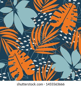 Trending abstract seamless pattern with colorful tropical leaves and plants on blue background. Vector design. Jungle print. Floral background. Printing and textiles. Exotic tropics. Fresh design.