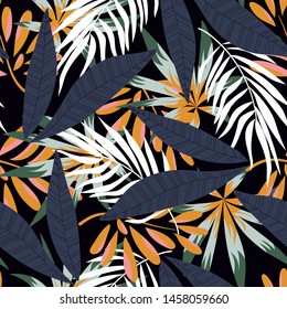 Trending abstract seamless pattern with colorful tropical leaves and plants on a dark background. Vector design. Jungle print. Flowers background. Printing and textiles. Exotic tropics. Fresh design.
