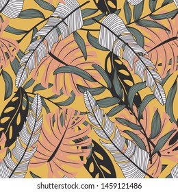 Trending abstract seamless pattern with colorful tropical leaves and plants on yellow background. Vector design. Jungle print. Flowers background. Printing and textiles. Exotic tropics. Fresh design.