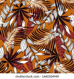 Trending abstract seamless pattern with colorful tropical leaves and plants on orange background. Vector design. Jungle print. Flowers background. Printing and textiles. Exotic tropics. Fresh design.