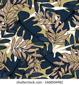 Trending abstract seamless pattern with colorful tropical leaves and plants on yellow background. Vector design. Jungle print. Floral background. Printing and textiles. Exotic tropics. Summer.