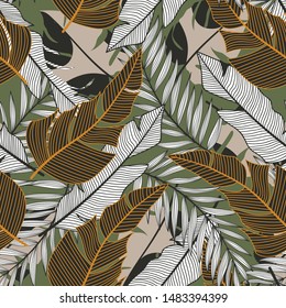Trending abstract seamless pattern with colorful tropical leaves and plants on green background. Vector design. Jungle print. Floral background. Printing and textiles. Exotic tropics. Summer.