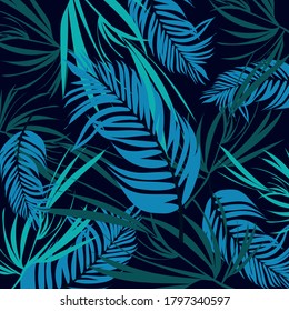 Trending abstract seamless pattern with colorful tropical leaves and plants on black background. Vector design. Jungle print. Flowers background. Printing and textiles. Exotic tropics. Fresh design.