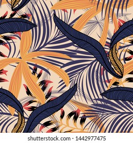 Trending bright seamless pattern with colorful tropical leaves and plants on yellow background. Vector design. Jungle print. Floral background. Printing and textiles. Exotic tropics. Fresh design.