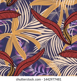 Trending bright seamless pattern with colorful tropical leaves and plants on purple background. Vector design. Jungle print. Floral background. Printing and textiles. Exotic tropics. Fresh design.