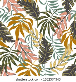 A trending seamless pattern with tropical leaves and bright plants on a white background. Print of the jungle. Vector design. On a floral background. Textiles and printing. Exotic, tropical.