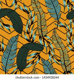 Trendy abstract seamless pattern with colorful tropical leaves and flowers on an orange background. Vector design. Jungle print. Floral background. Printing and textiles. Exotic tropics. Summer design